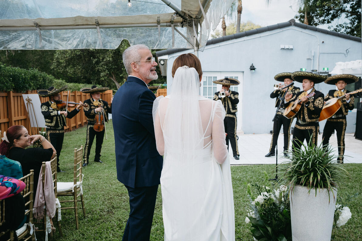A backyard celebration in Coral Gables with the bride & groom, traditional mariachi, and their closest friends and family.